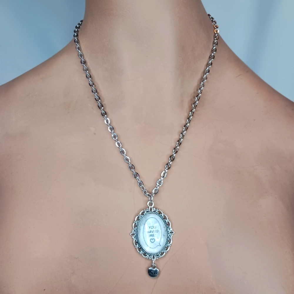 Distressed Manga Speech Bubble You Saved Me Pendant in Silver Frame with Heart.